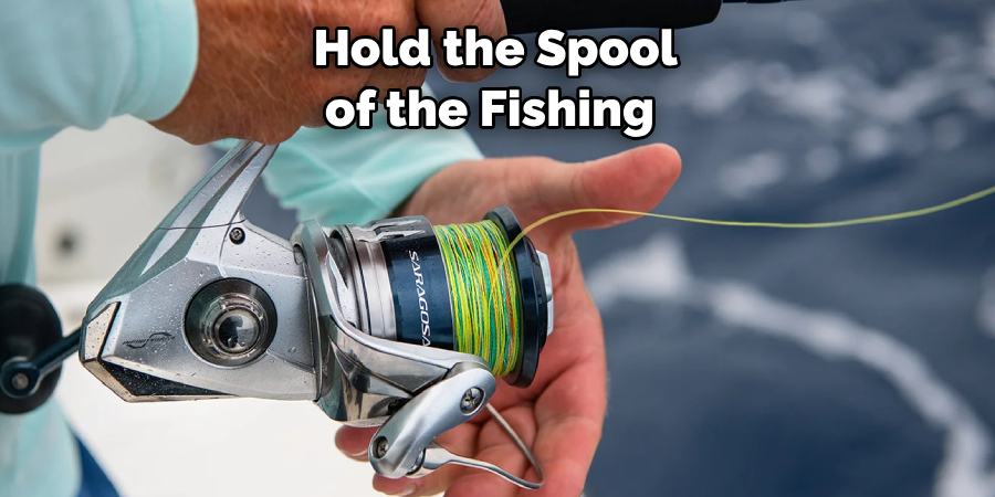 Hold the Spool of the Fishing