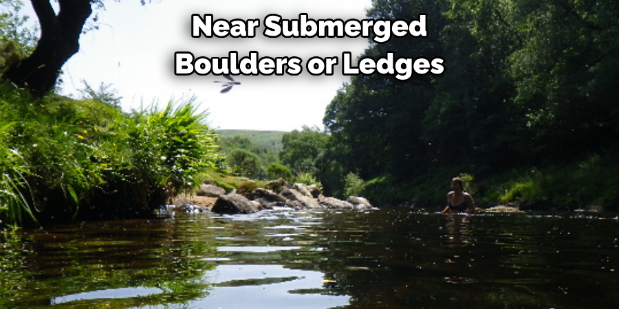 Near Submerged Boulders or Ledges