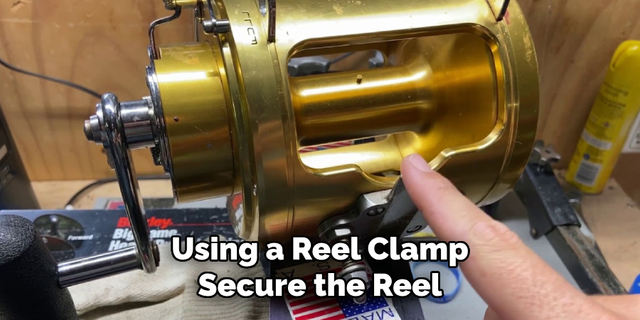 Using a Reel Clamp, Secure the Reel