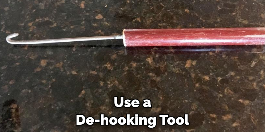 Use a De-hooking Tool