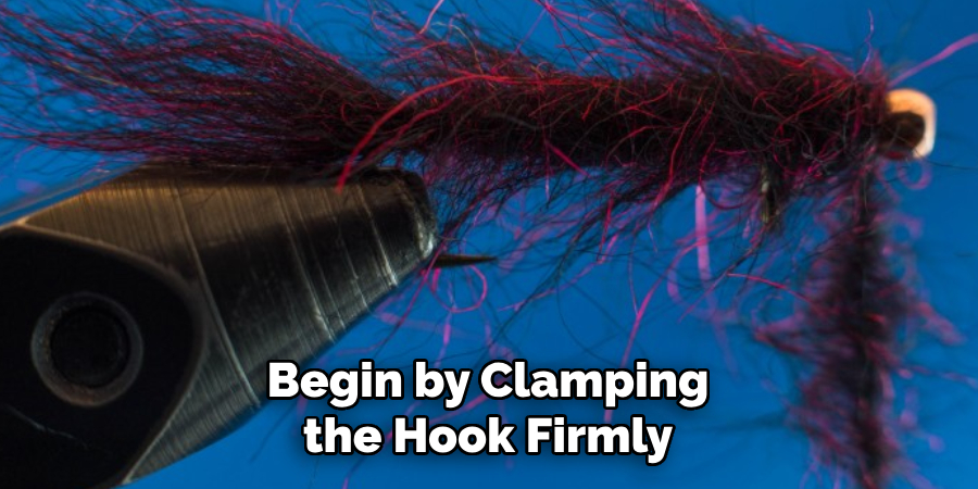 Begin by Clamping the Hook Firmly