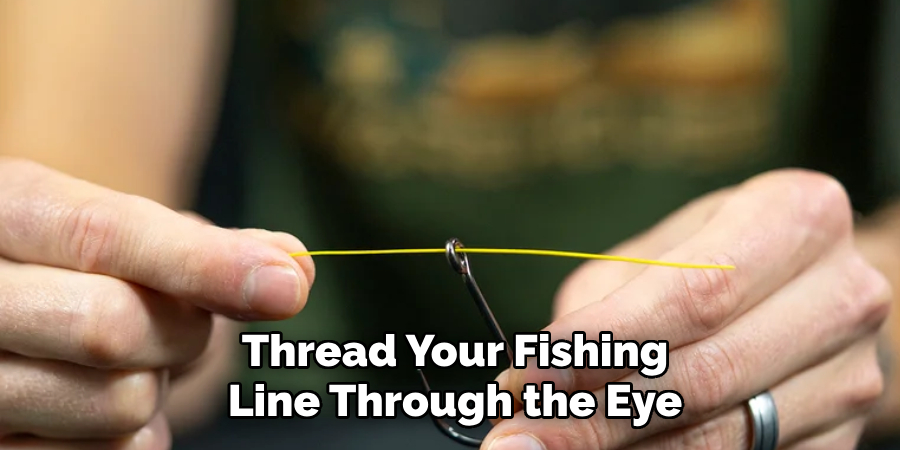 Thread Your Fishing
Line Through the Eye